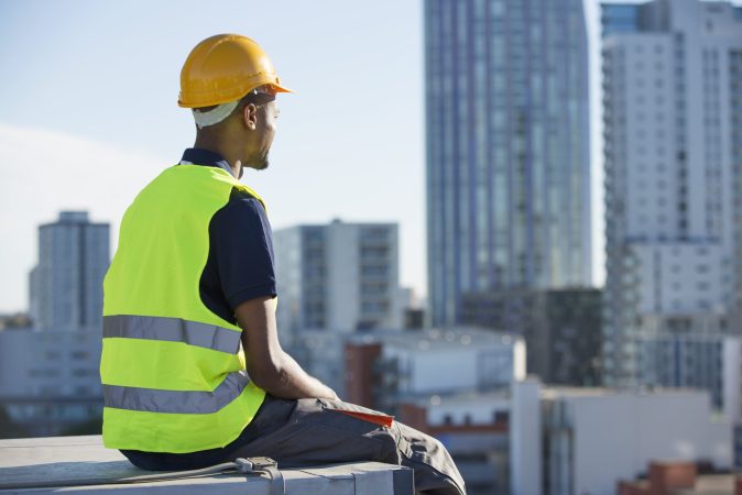 construction-worker-sitting-on-ledge-outdoors-ta-2022-03-04-01-51-50-utc-min