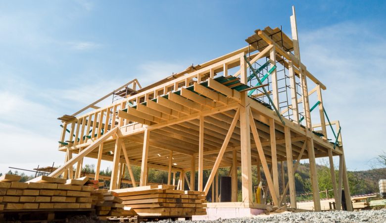 framing-of-a-new-wooden-house-under-construction-2021-08-29-16-24-39-utc-min